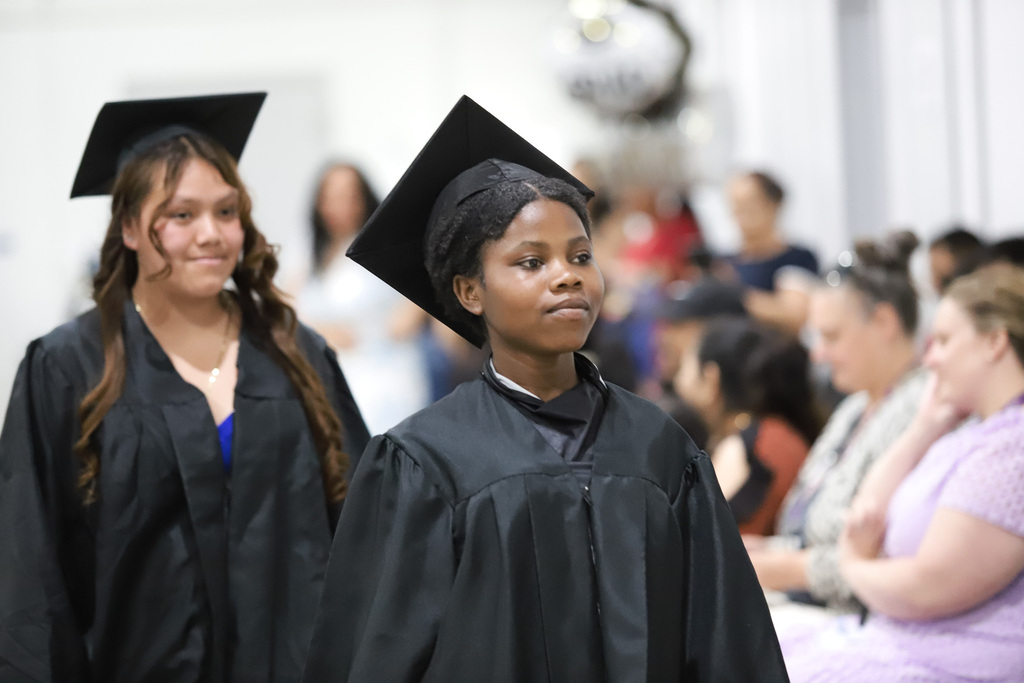 Graduates leaving Moving Up Ceremony