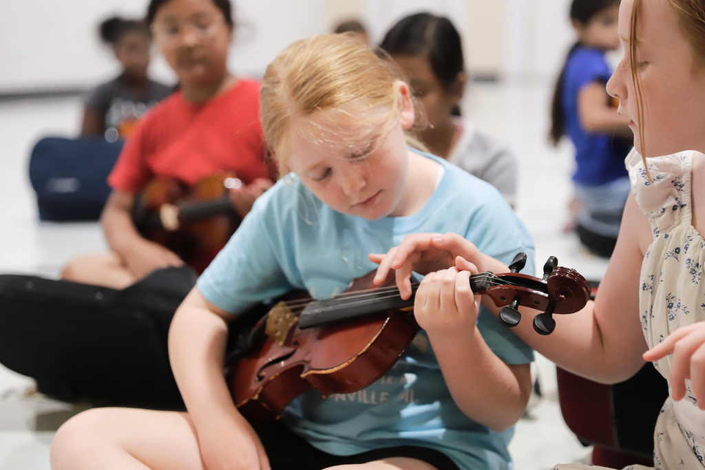 Learning the strings in 4th grade