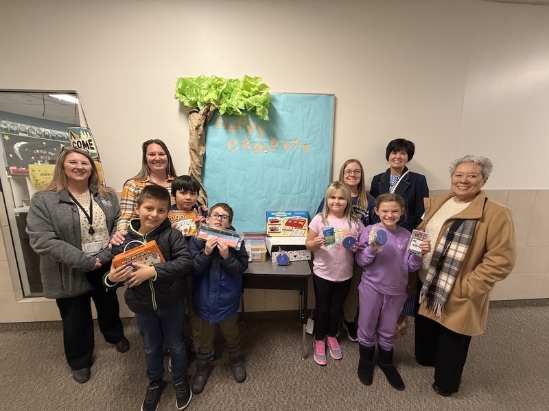 STEM Intervention project students holding up STEM items