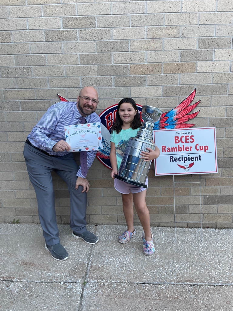 Rambler Cup winner poses with the principal