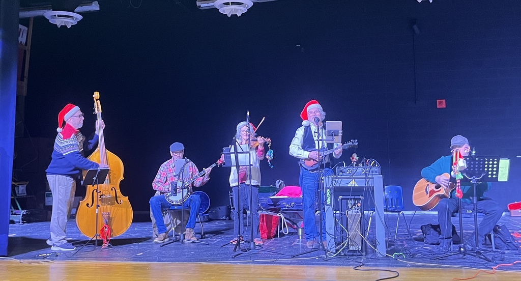 Dollar in the Juke Box band plays for students at lunch