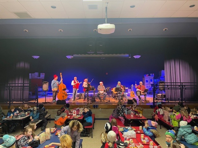 Dollar in the Juke Box band plays for students at lunch