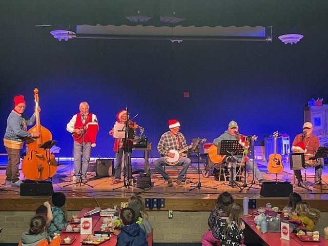 Dollar in the Juke Box band plays for students at lunch