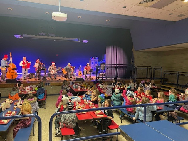 Dollar in the Juke Box band plays for students at lunch