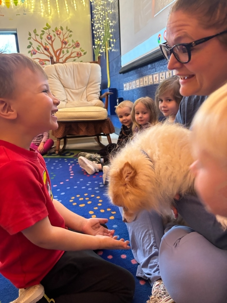 Mrs. Eaton's dog, Buddy, came to visit for his 14th birthday!