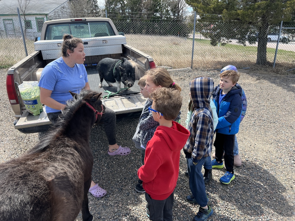 kids with farm animals 