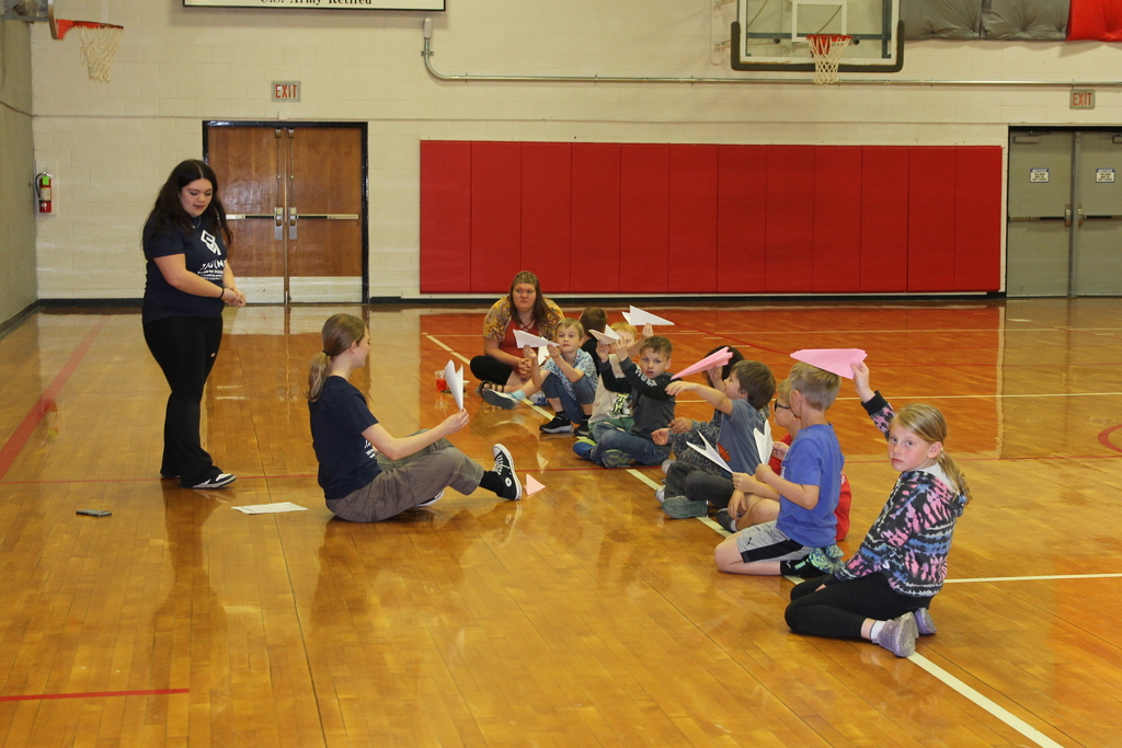 paper airplanes in the gym 