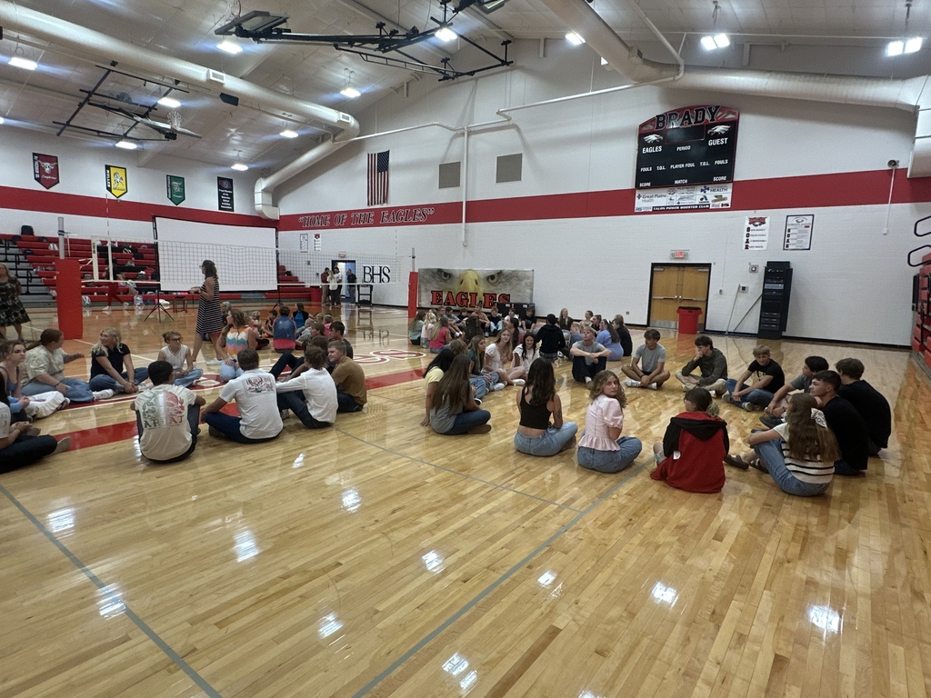 students sitting in class circles 