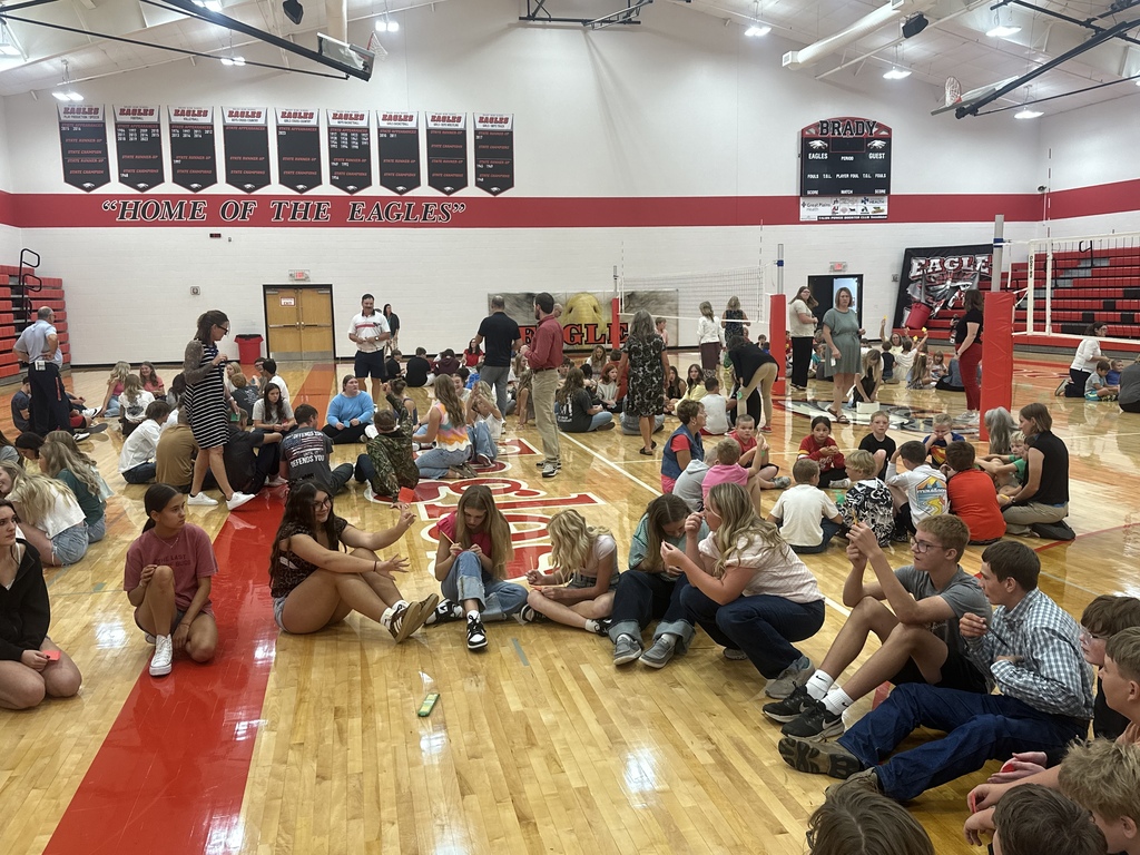 students sitting in class circles 