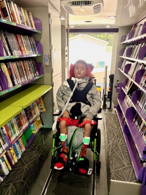 Miguel was able to board the Bookmobile!