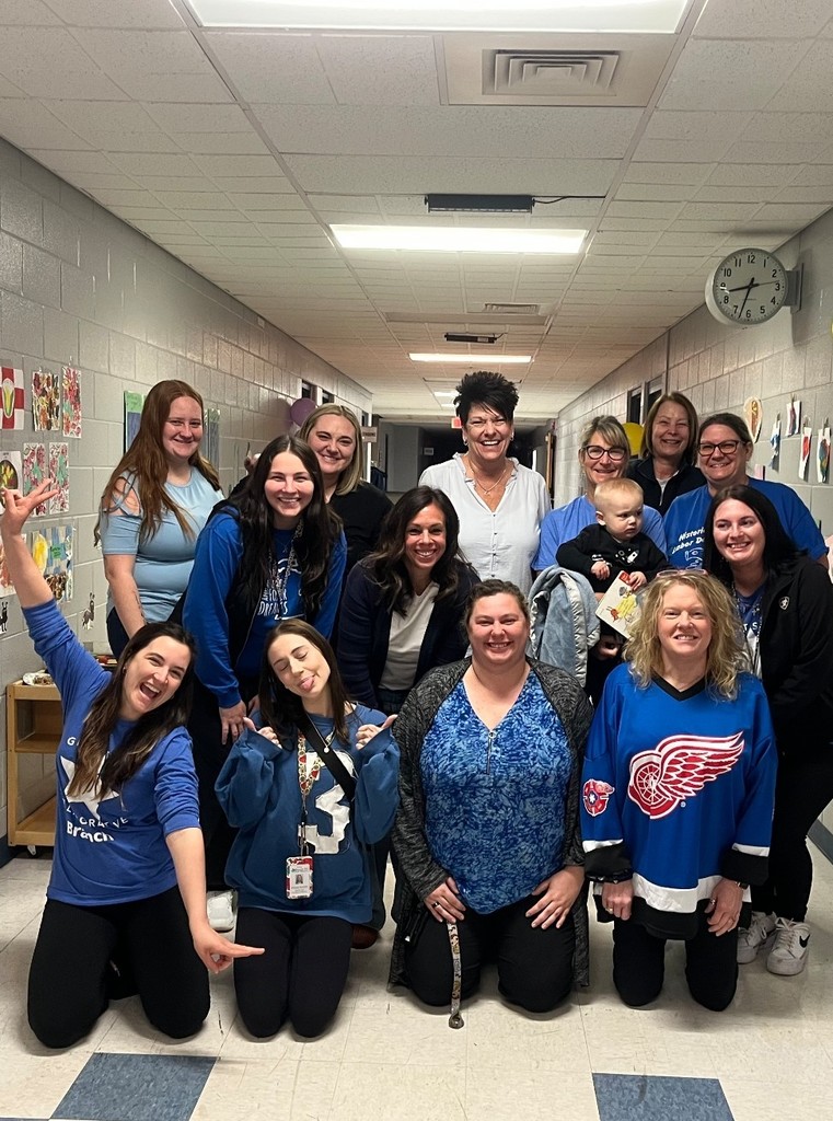Staff wearing BLUE for Child Abuse Prevention Awareness month