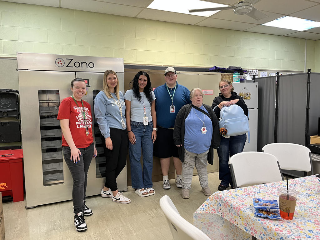 Staff wearing BLUE for Child Abuse Prevention Awareness month