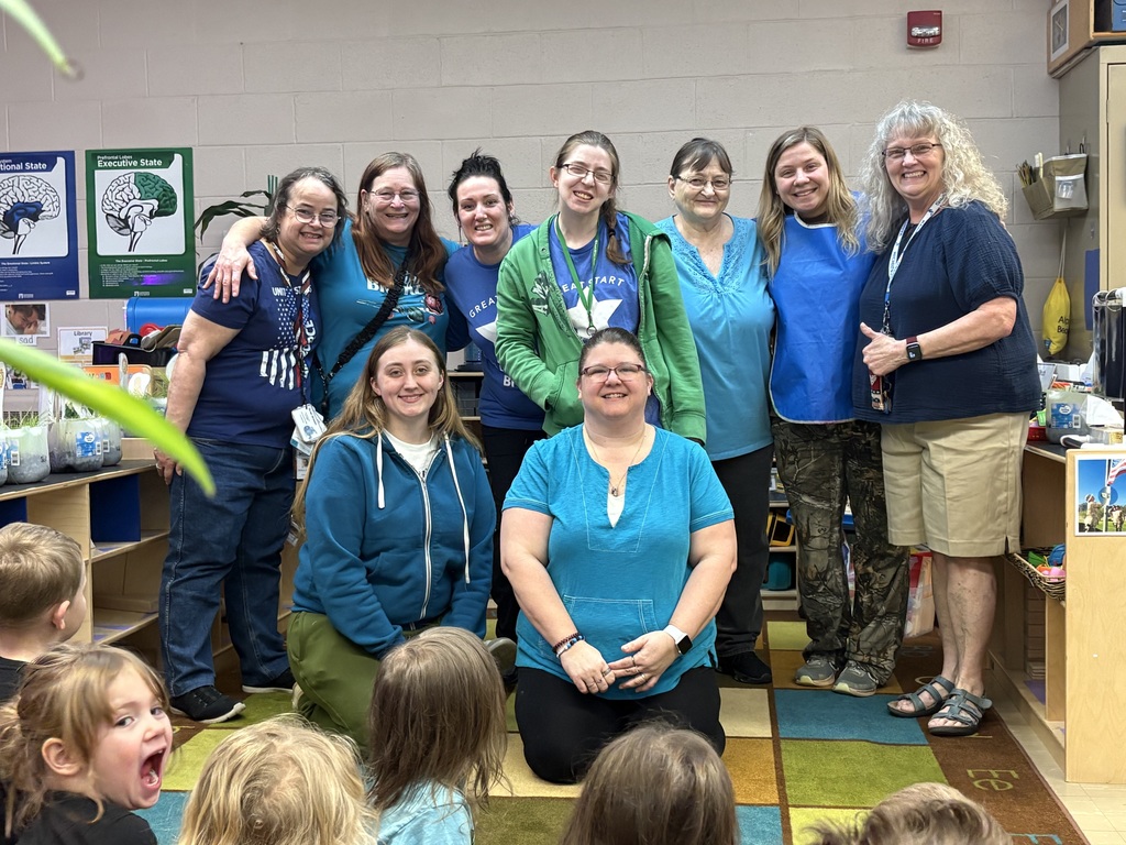 Staff wearing BLUE for Child Abuse Prevention Awareness month