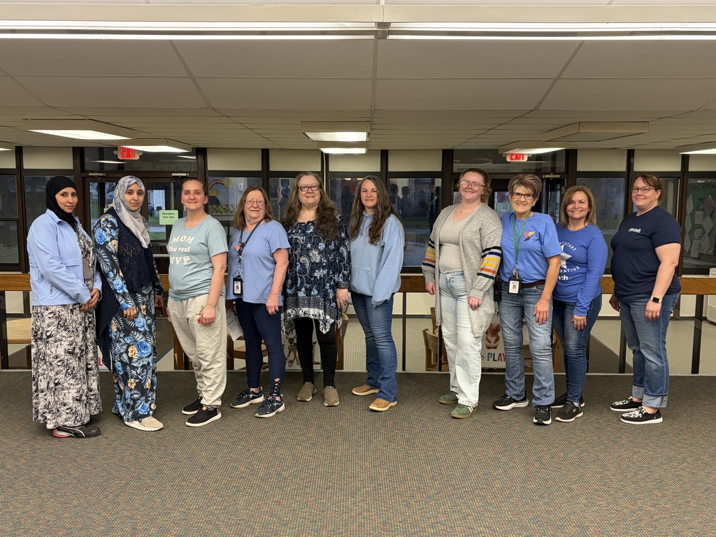 Staff wearing BLUE for Child Abuse Prevention Awareness month