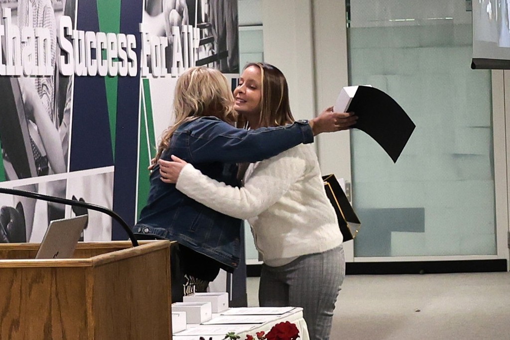 Johnnie Dowell accepts her award for Special Education Paraprofessional of the Year. 