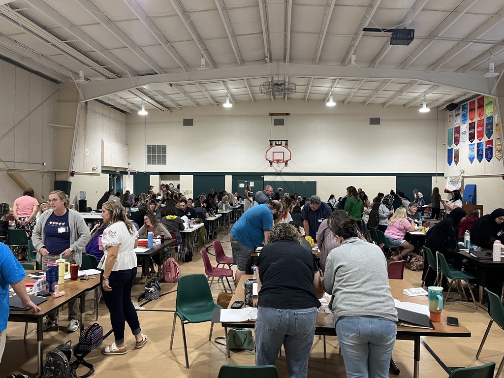 Paraprofessionals in gymnasium during training