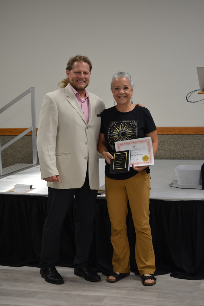 Teacher receiving recognition for 25 yrs of service
