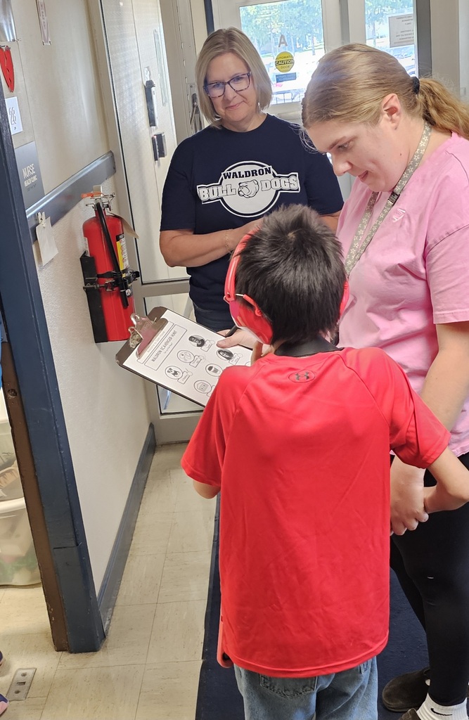 Principal Christa welcoming students