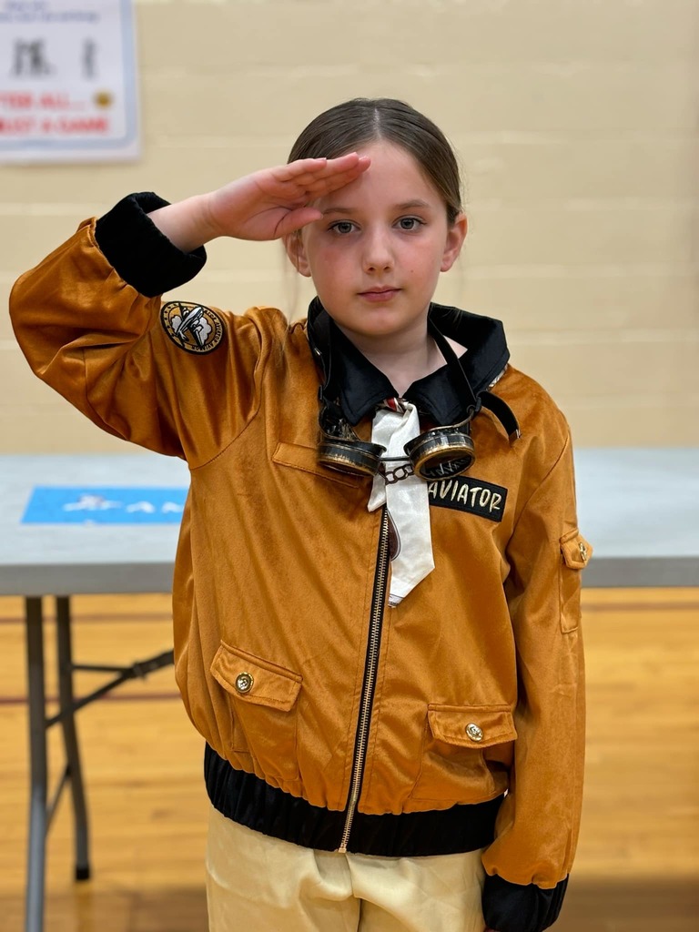 little girl dressed as aviator