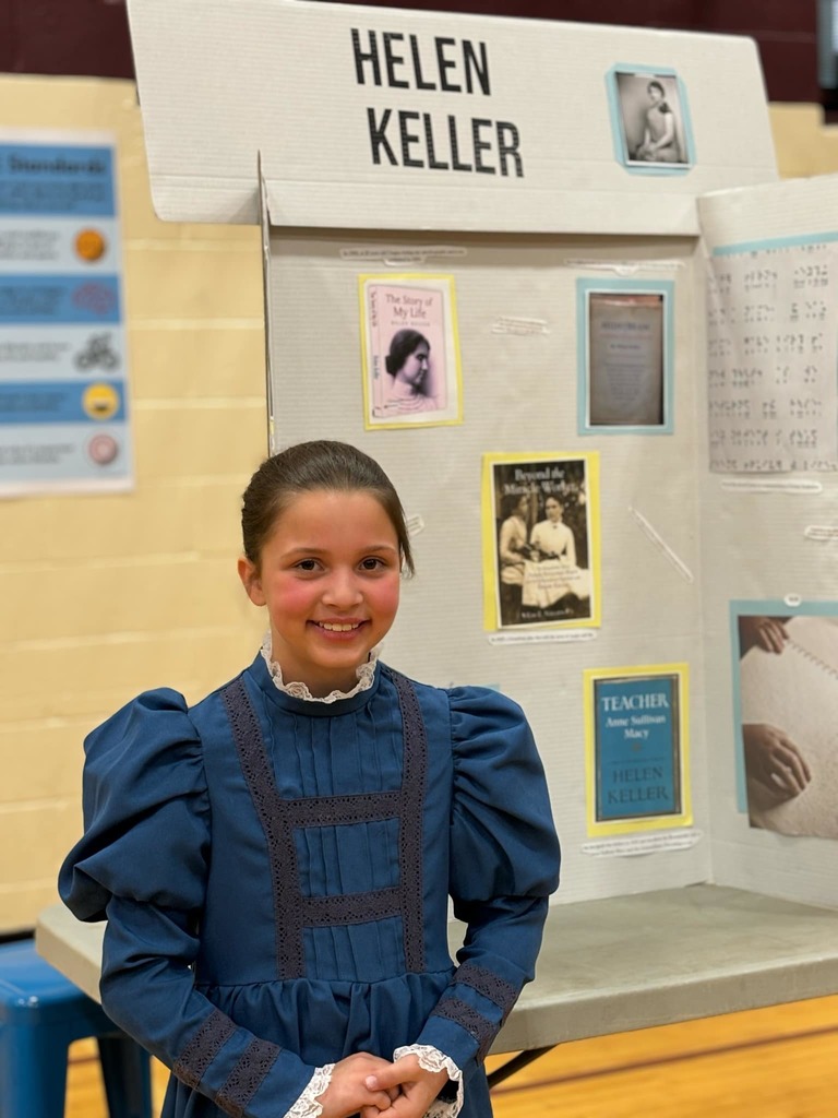 little girl dressed as Helen Keller