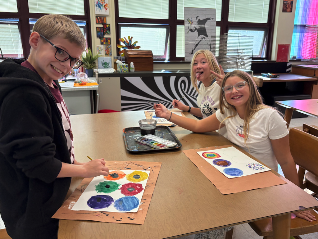 students making dots in art class