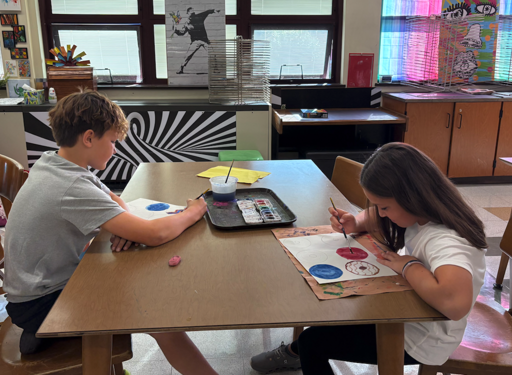 students making dots in art class