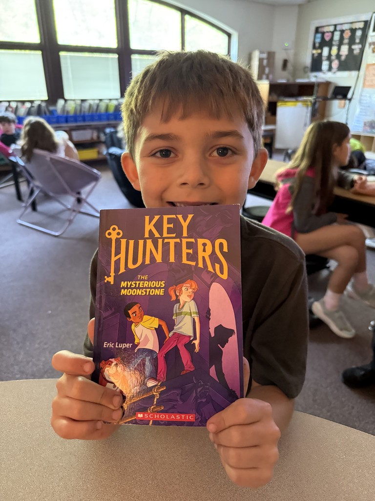 student with a book
