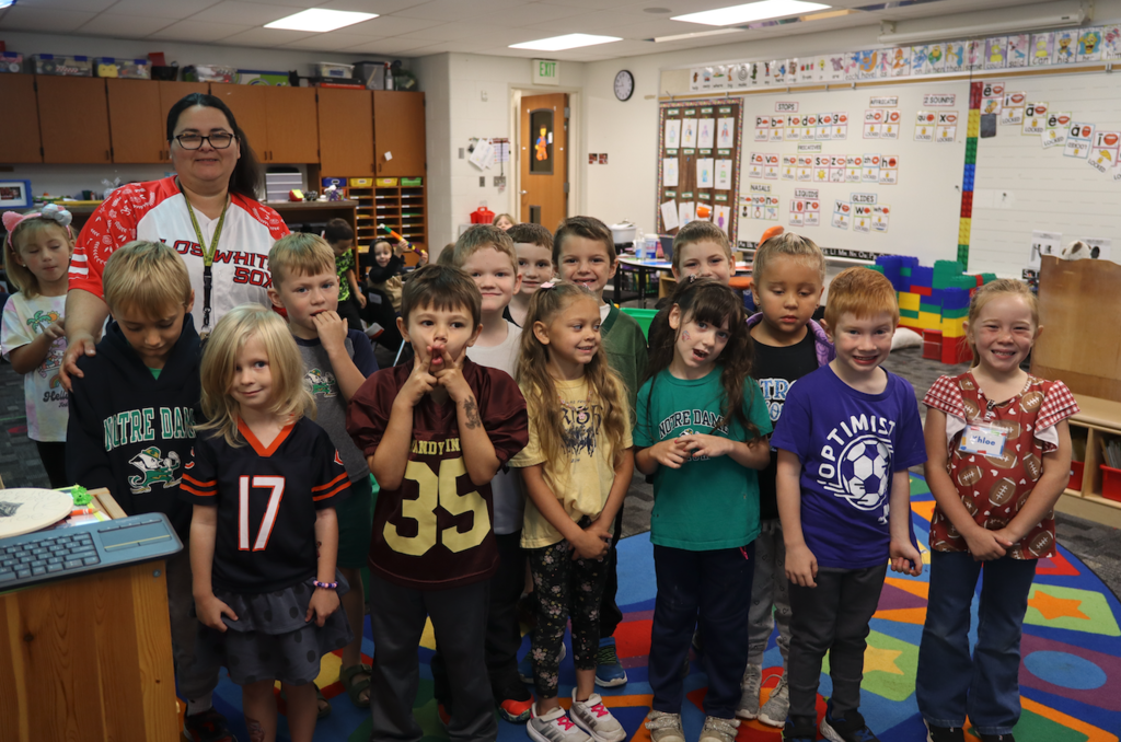 class in their team shirts