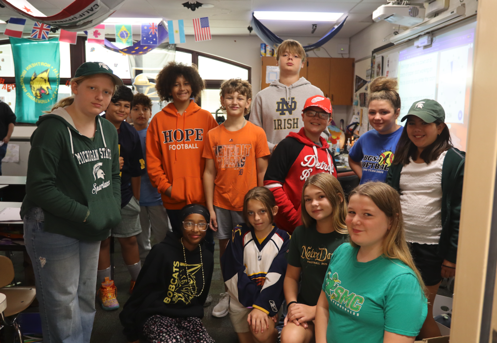 class in their team shirts