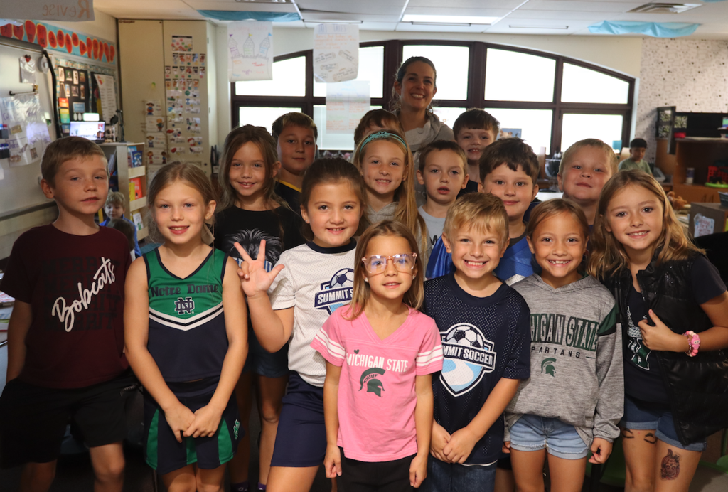 class in their team shirts