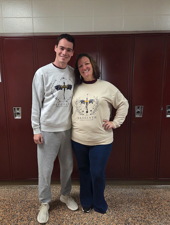two teachers wearing matching sweatshirts