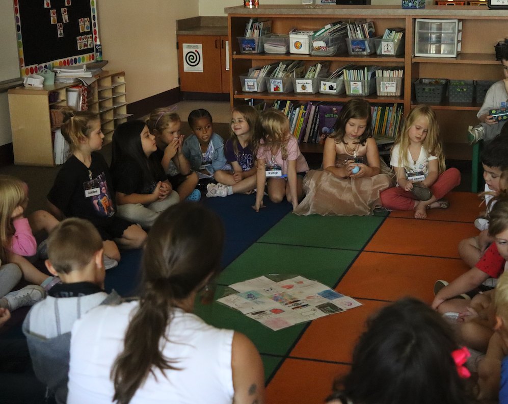 group of kids sitting in a circle