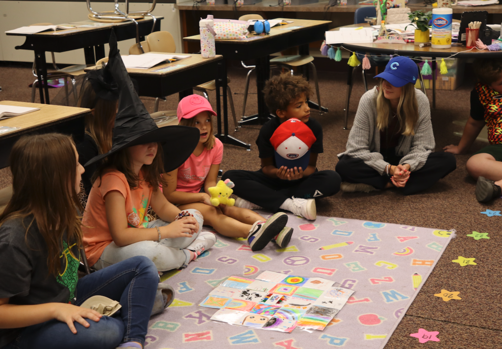 group of kids sitting in a circle
