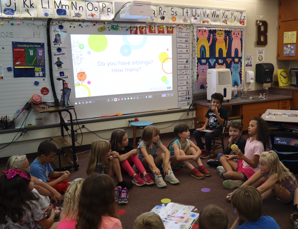 group of kids sitting in a circle