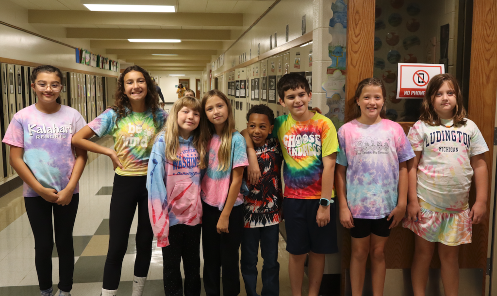 group of students wearing tie dye