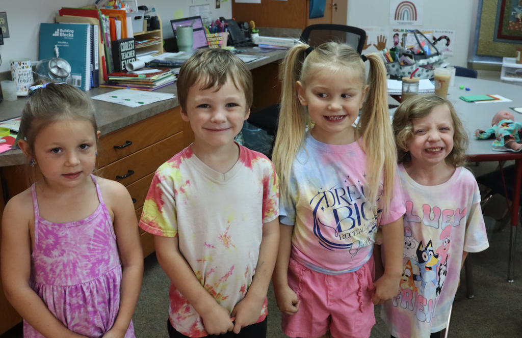group of students wearing tie dye