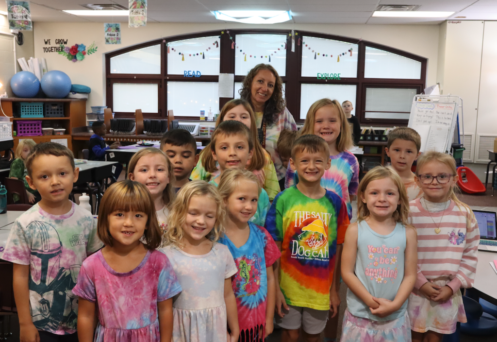 group of students wearing tie dye