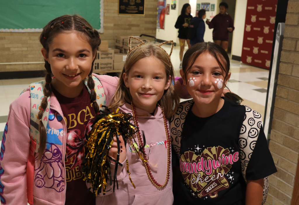 three girls in spirit wear
