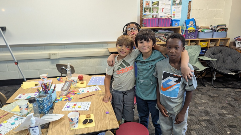 students with arms around each other