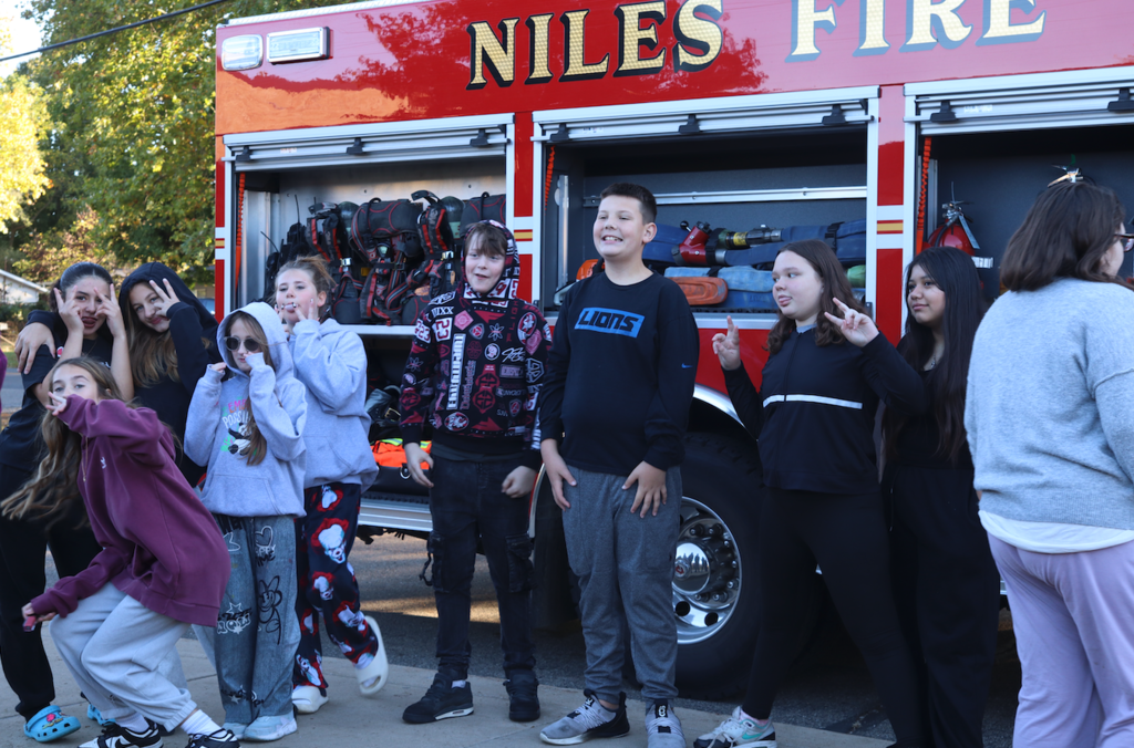 kids in front of a fire truck