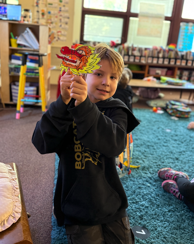 student with Chinese dragon
