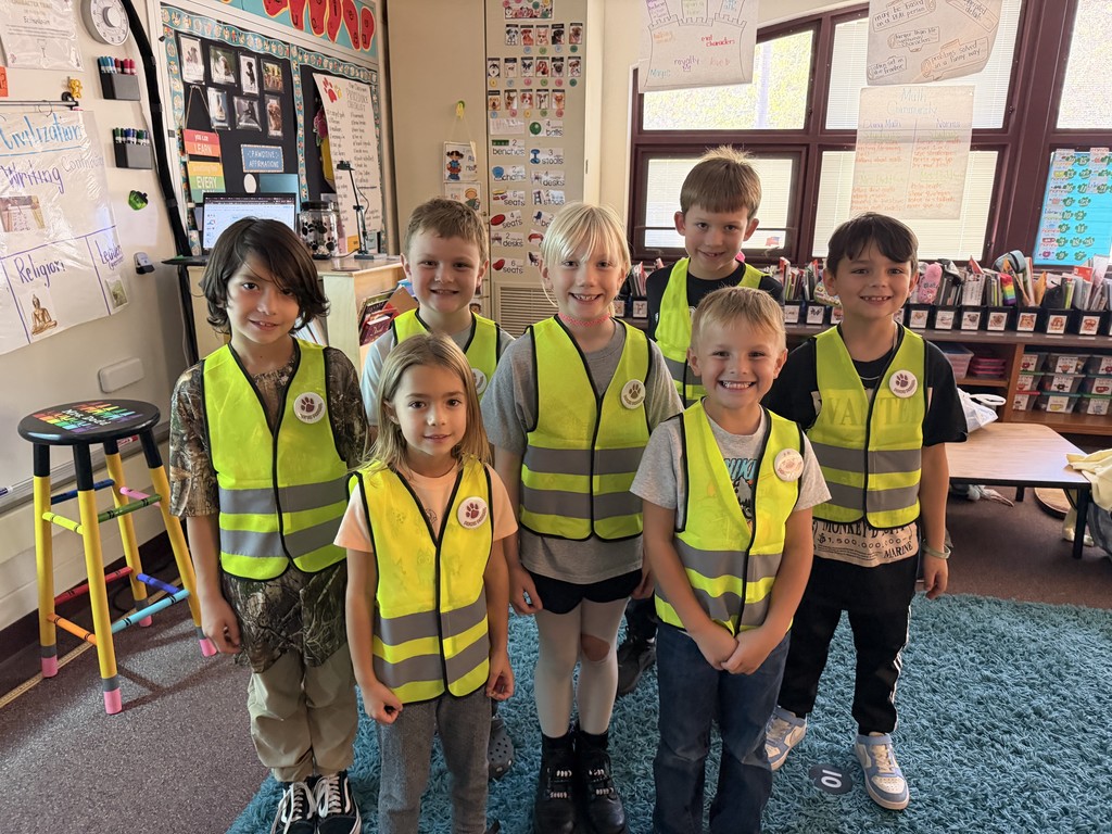 group of kids in safety vests
