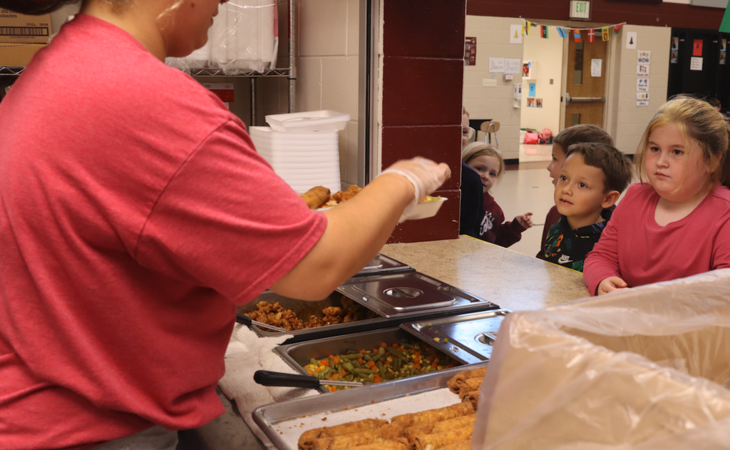 kids standing in line for lunch