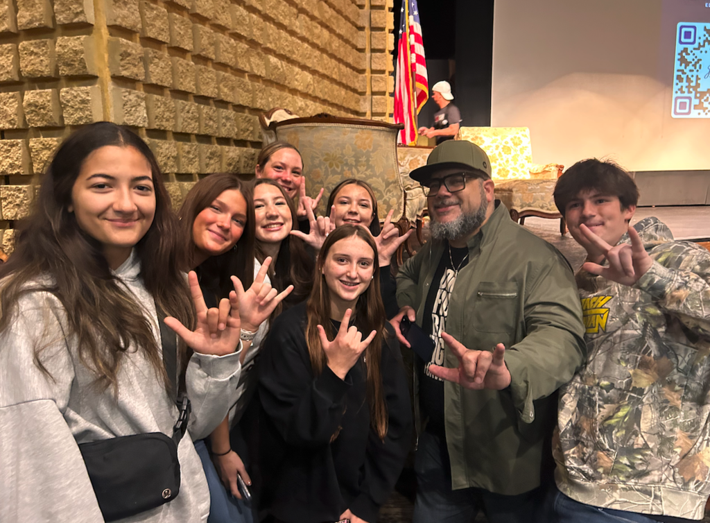group of students with guest speaker