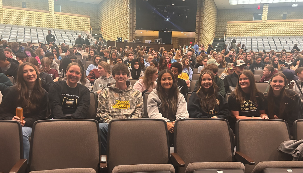 group of students at conference smiling