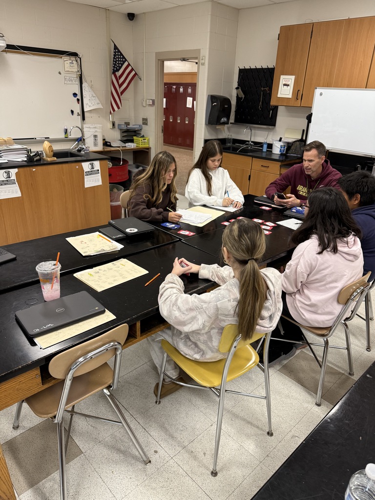students playing a game with a teacher