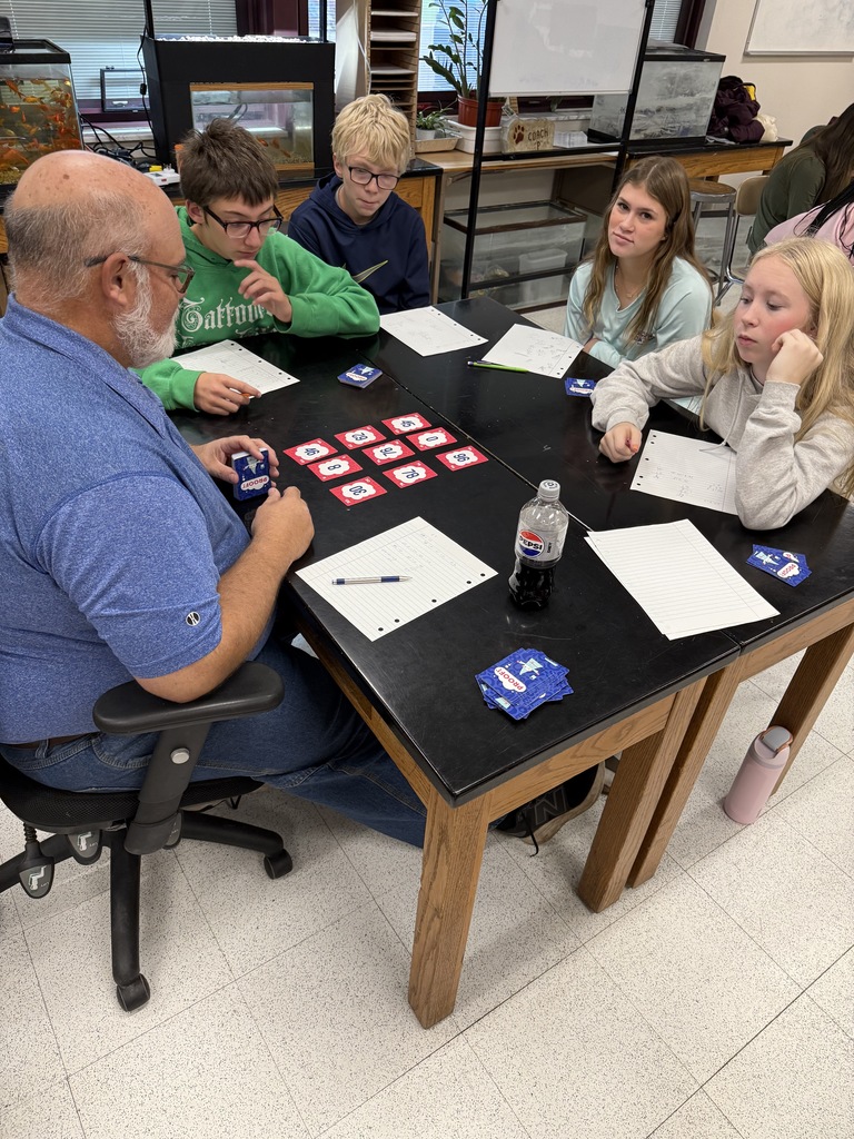 students playing a game with a teacher