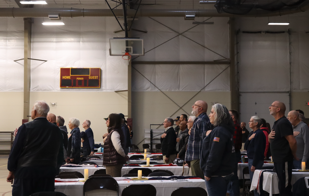veterans standing for national anthem