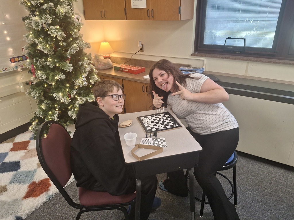 two kids playing chess
