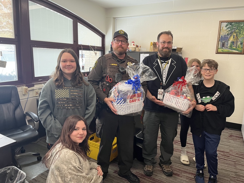 two veterans with students